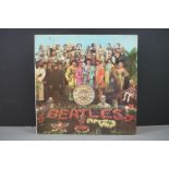 Vinyl - The Beatles Sgt Pepper (PMC 7067) Sold In UK and The Parlophone Co Ltd to label. Laminated
