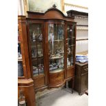 Edwardian Mahogany Inlaid Glazed Display Cabinet with central bow front, raised on square tapering