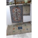 Indian Grey Rug decorated with stylised animals, 90cms x 140cms together with a matching Mat and a