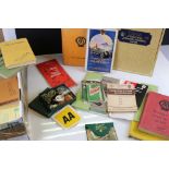 A group of AA Automobile Association collectables to include books, maps, keys and badges.