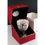 A cased Queen Elizabeth the Queen Mother Centenary Cup, marked Wemyss 1980 by Royal Doulton.