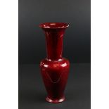 Bernard Moore, Red Flambe Vase decorated with flowers,signed to base (repair to rim), 31cms high