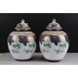 Pair of Staffordshire Porcelain Lidded Jars by Roselle Occ decorated with flowers, 26cms high