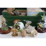 A collection of ceramic and resin ornaments to include Border Fine Arts The World Of Beatrix Potter.