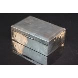 A fully hallmarked sterling silver cigarette box, assay marked for Birmingham and dated for 1925.