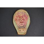 Early 20th century child's flipper toy with devil's head decoration