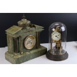 An antique green onyx mantle clock together with an anniversary example.