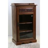 Edwardian Mahogany Music Cabinet with single glazed door opeing to shelves, 53cms wide x 92cms high