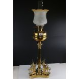 Late 19th / Early 20th century Tall Oil Lamp on Corinthian Column Brass Base, the triangular base