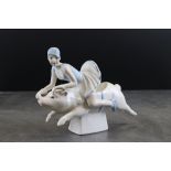 Ceramic Art Deco style figure of a lady riding a pig