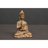 Bronze seated Buddha at prayer holding an incense burner