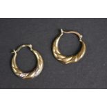 Pair of mixed gold hoop style earrings