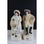 Two vintage Staffordshire flatback figures.