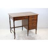 Early 20th century Oak Desk with leather inset top and a single pedestal of four drawers, raised