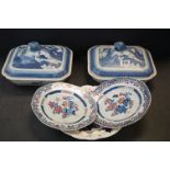 A pair of Chinese blue and white lidded tureens together with two famille rose plates & one other