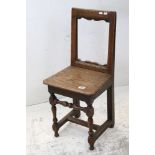 18th century or later Oak Child's Chair with square open back and solid seat, possibly a