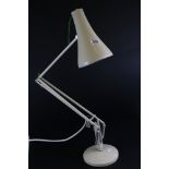 A vintage white Herbert Terry Angle poise table lamp.