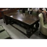 Oak Refectory Table, 17th century and later, the cleated top over a carved apron, substantial carved