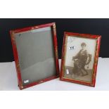 Two Early to Mid 20th century Chinoiserie Red Lacquered Photograph Frames, the largest retailed by