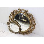Gilt Framed Convex Mirror together with a smaller Oval Mirror in metal frame, 56cms diameter