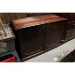19th century Mahogany Side Cabinet, the two panel doors opening to a bank of six short drawers,