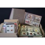 A collection of vintage cigarette cards to include loose and album mounted examples together with