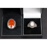 A collection of three boxed ladies 925 sterling silver rings to include an Opal and marcasite