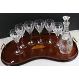 A crystal cut decanter together with a set of six Royal Scot crystal cut wine glasses and a mahogany