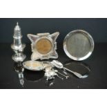 Collection of silverware to include three photo frames, sugar shaker, mustard pot & spoons