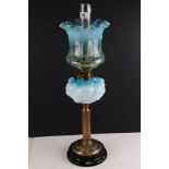 Late 19th / Early 20th century Oil Lamp with turquoise embossed glass font, brass column and