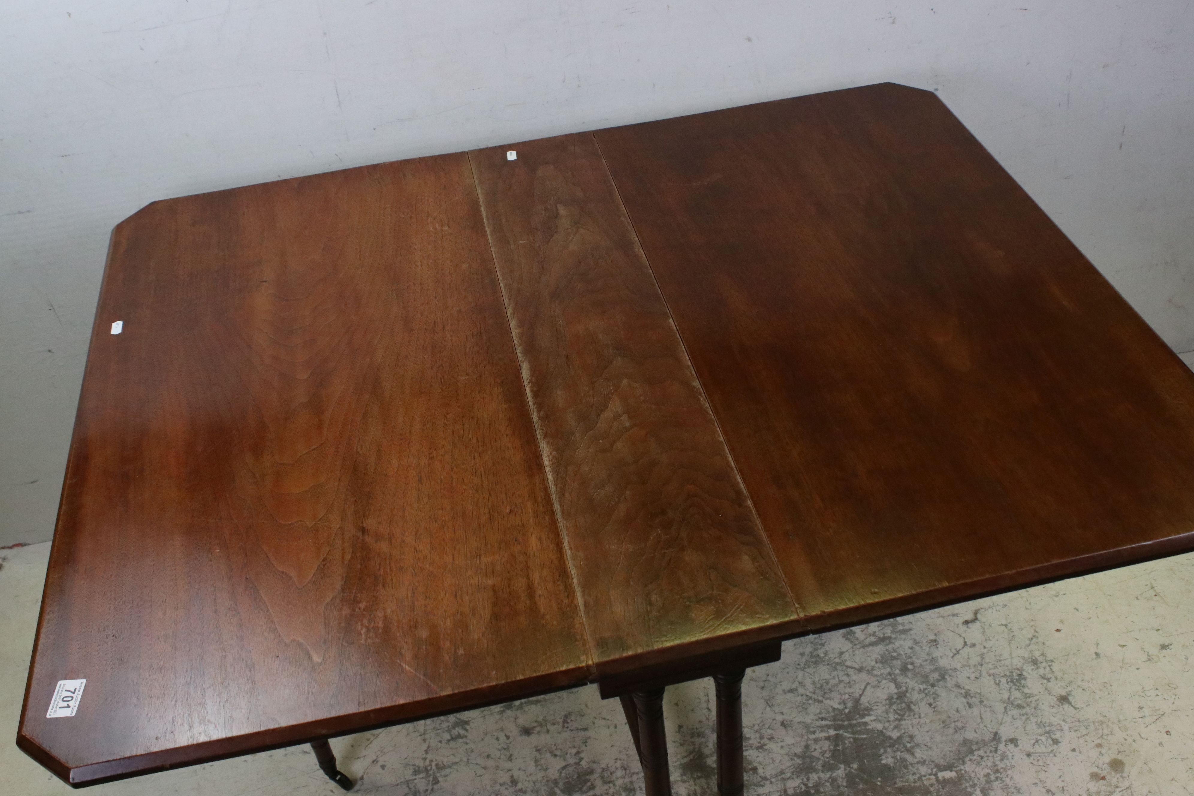 Edwardian Mahogany Sutherland Table raised on turned ringed supports, 92cms long x 69cms high - Image 3 of 10