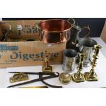 A collection of mixed metalware to include brass candlesticks, pewter tankards, brass ornaments..