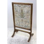 Gilt Framed Firescreen, the central panel with a silk and gold thread floral embroidery in the