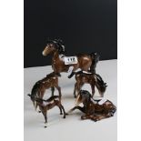 Beswick Brown Prancing Arab (no. 1261) together with Four Beswick Foals
