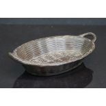 Cast iron bronzed pin dish in the form of a wicker basket