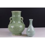 Two Oriental Celadon Glazed Vases including a Korean Bottle Vase decorated with Cranes and Clouds,