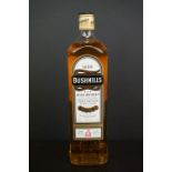 A 1 litre sealed bottle of Bushmills Irish Whiskey.