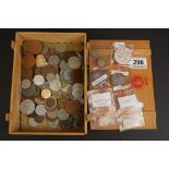 A small collection of British predecimal and foreign coins to include silver examples.