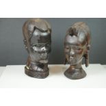 Two hand carved solid wood African busts, possibly ebony