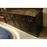 18th century Oak Dresser Base with Five Drawers above two panel cupboard doors and three further