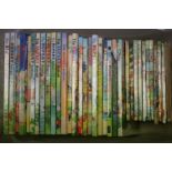 A large collection of approx thirty four Rupert Bear annuals dating from the 1970's onwards.