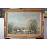 A framed oil on canvas of a village scene signed Donald Jenning (1903).