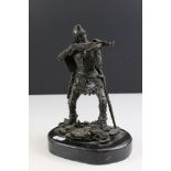Bronze sculpture of a warrior with crossbow
