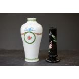 White ground glass vase with flower and leaf decoration, together with an aesphetic black glass