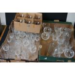 A large collection of mainly crystal cut glasses to include tumbles, wine glasses and champagne