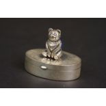 Silver oval pill box with teddy bear pincushion to the lid