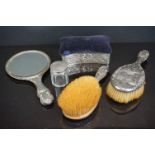 A collection of fully hallmarked sterling silver to include brush and mirror set and pin cushion