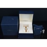 Boxed Raymond Weil 18ct gold plated 5888 dress watch with sapphire crystal and mother-of-pearl face
