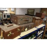 Four Late 19th / Early 20th century Canvas Covered Travelling Trunks together with Two Suitcases