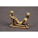 Small erotic metal sculpture
